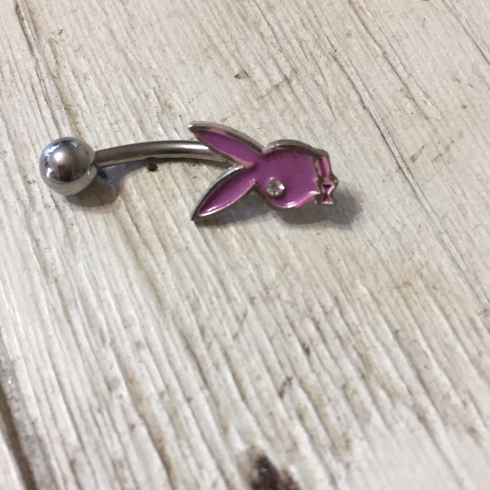 Playboy belly ring